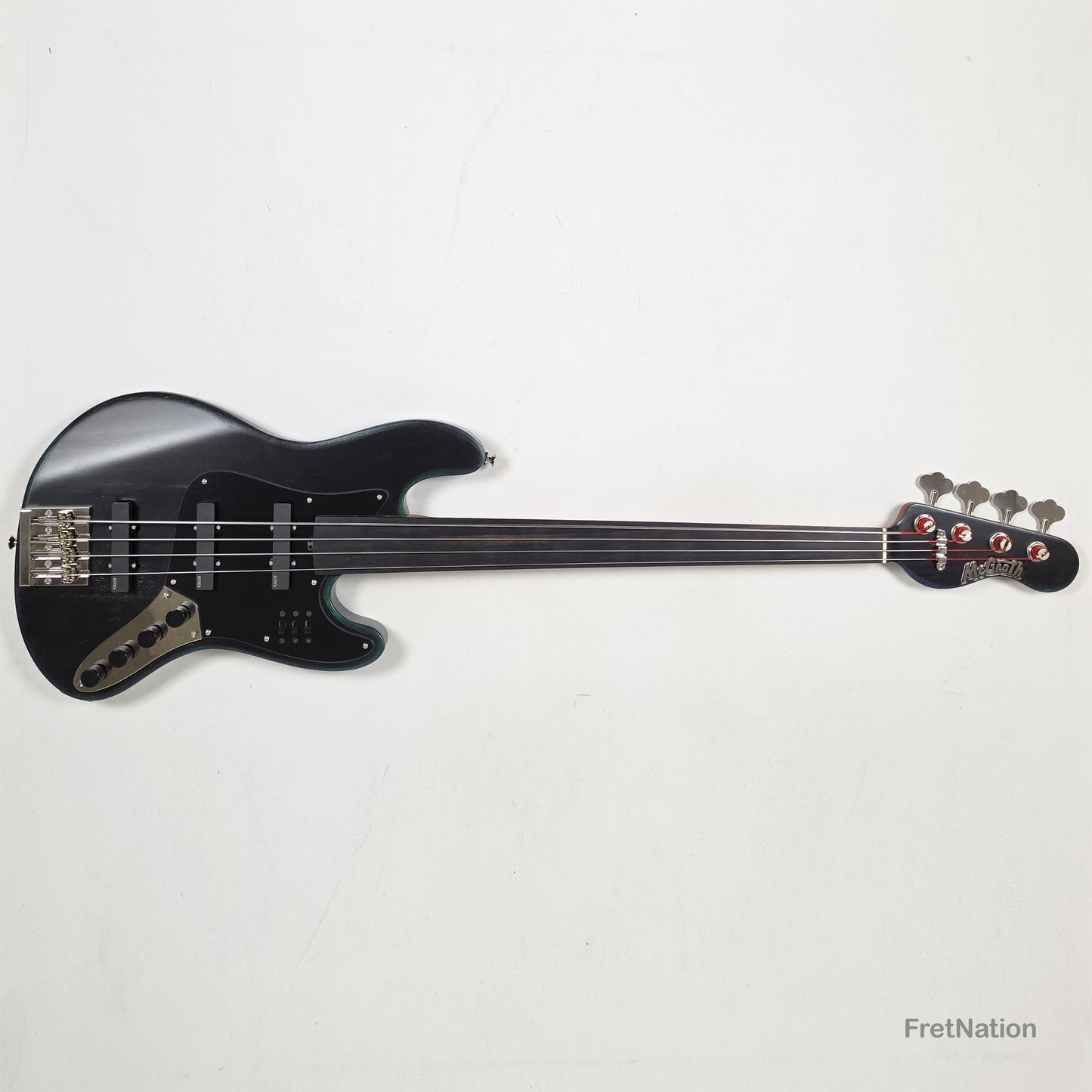 McGrath Guitars McGrath J-Style Thunderhorse IV 4-String Fretless Bass EMG - Orbital Ink 8.54lbs