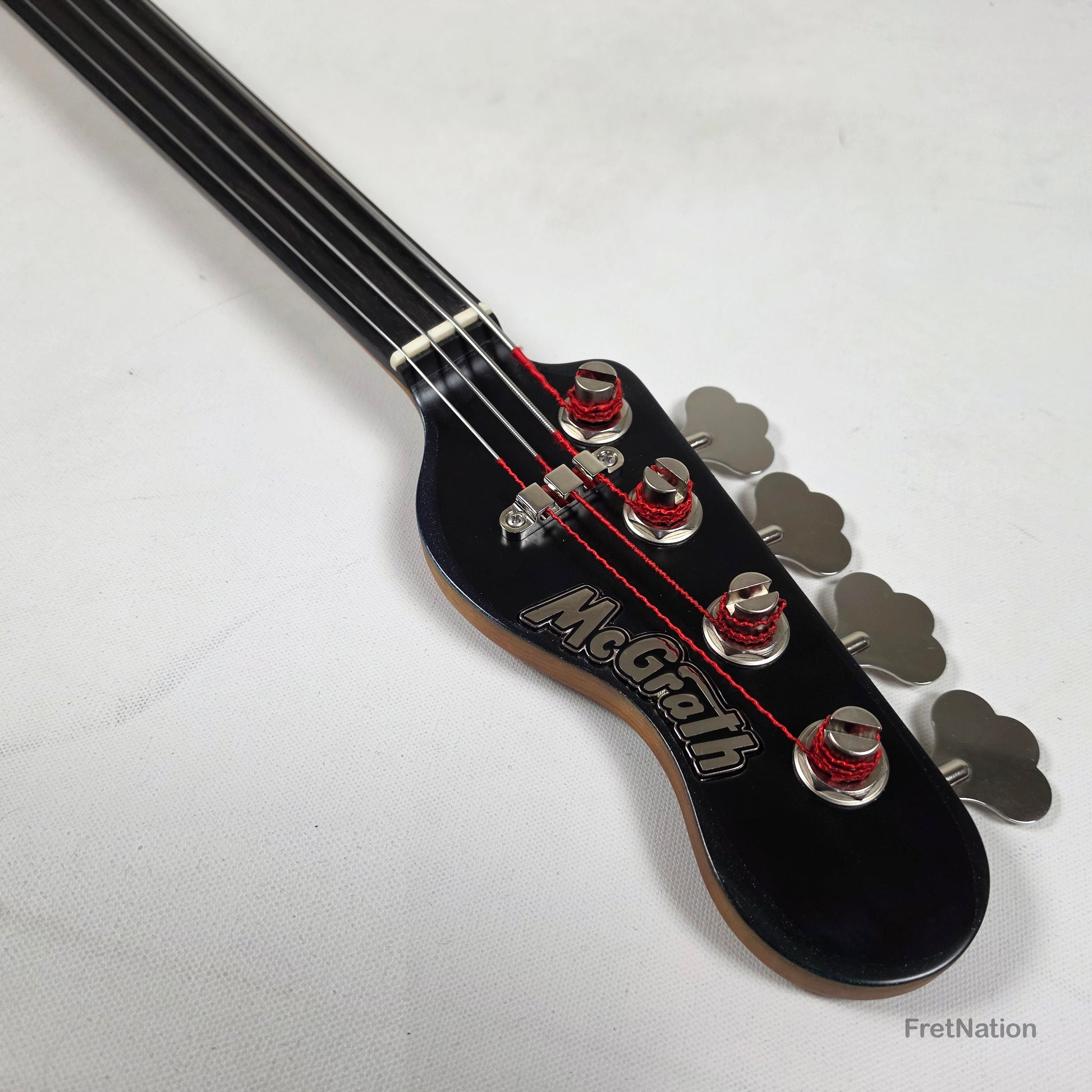 McGrath Guitars McGrath J-Style Thunderhorse IV 4-String Fretless Bass EMG - Orbital Ink 8.54lbs