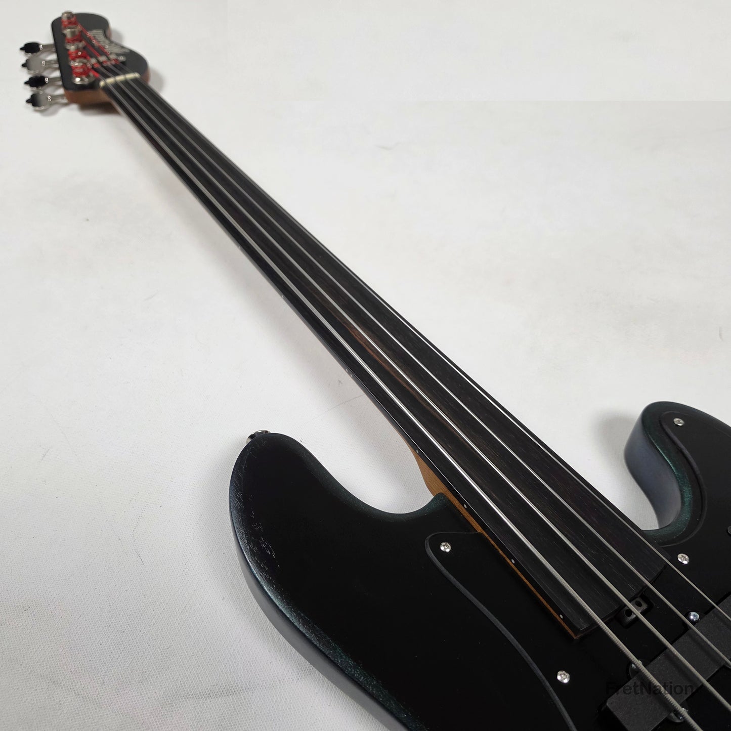 McGrath Guitars McGrath J-Style Thunderhorse IV 4-String Fretless Bass EMG - Orbital Ink 8.54lbs