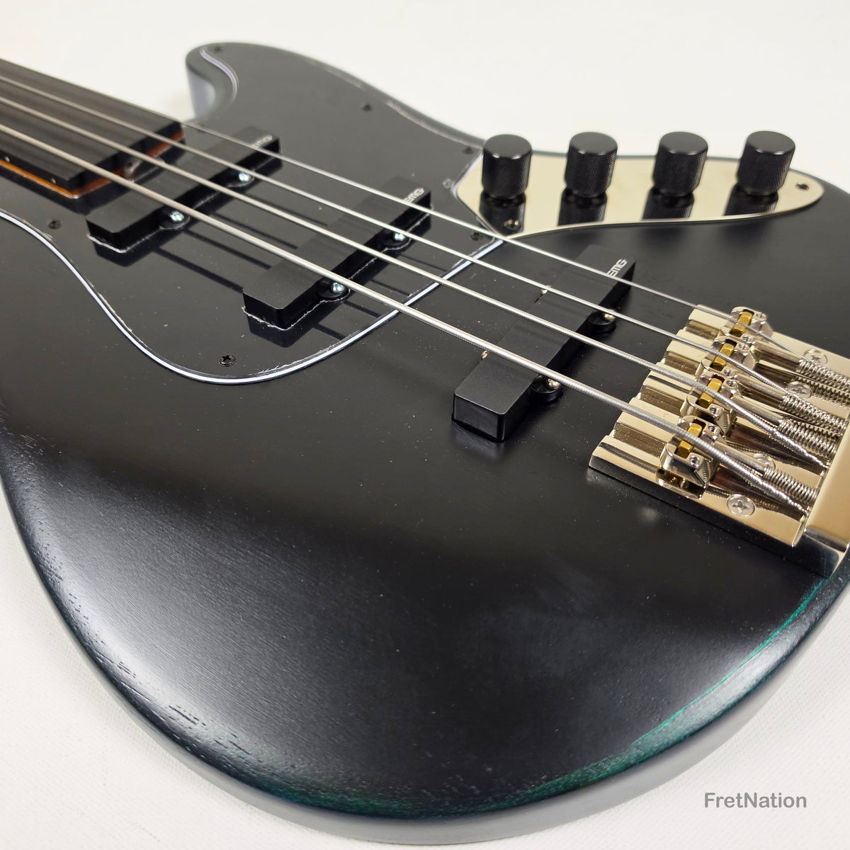 McGrath J-Style Thunderhorse IV 4-String Fretless Bass EMG - Orbital Ink 8.54lbs