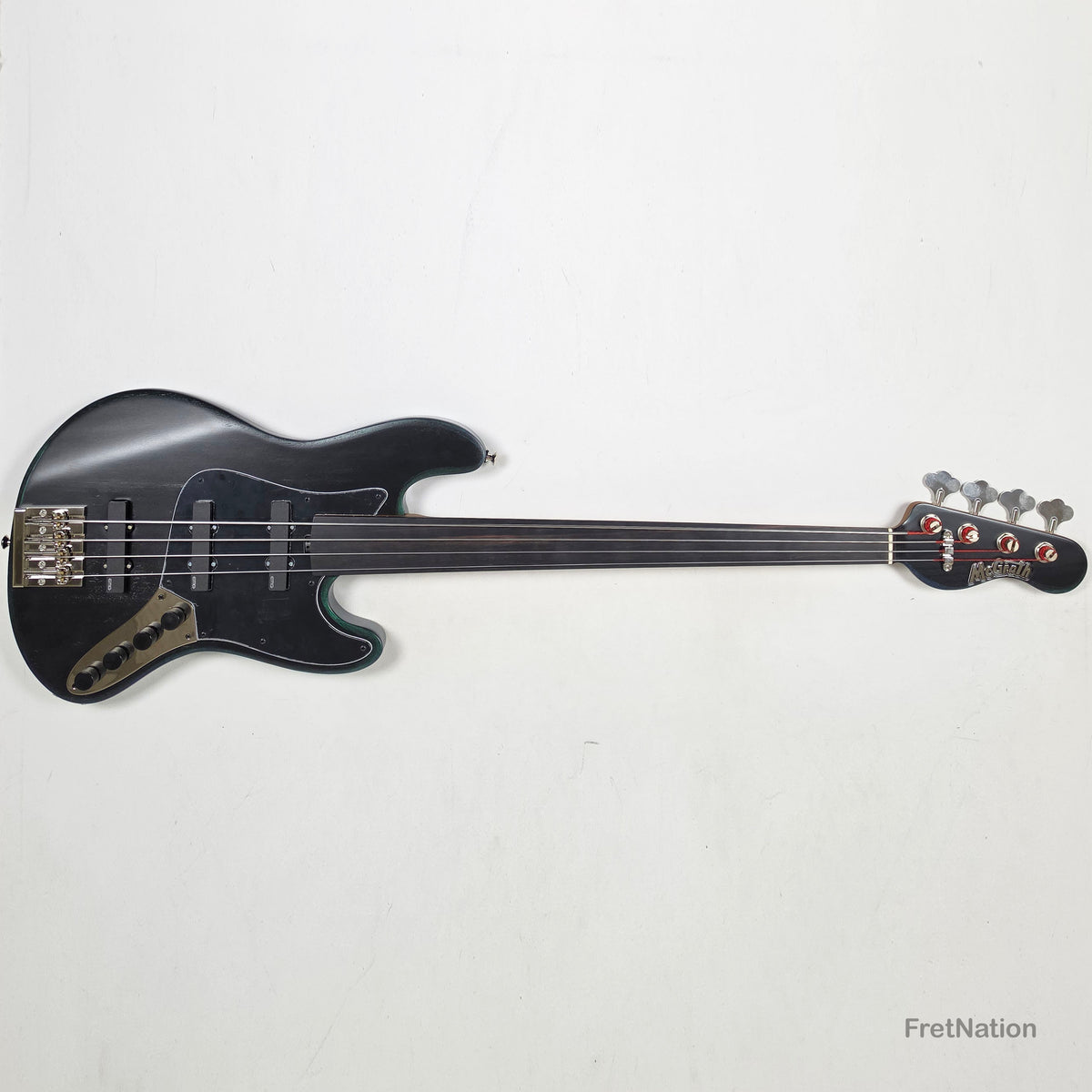 McGrath J-Style Thunderhorse IV 4-String Fretless Bass EMG - Orbital Ink 8.54lbs